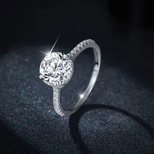 Elegant 925 sterling silver moissanite ring with round-cut stone and paved band
