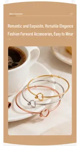 Detail shot of heart-shaped stainless steel bangles in gold, silver, and rose gold