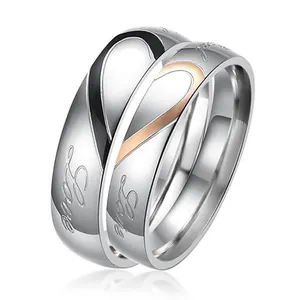 Creative couple rings with splicing heart design and Love engraving in silver finish