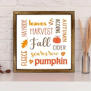 Close-up of rustic wooden fall-themed frame with harvest and pumpkin text decor