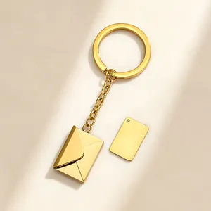 Elegant gold envelope keychain with a blank DIY metal tag for custom name engraving