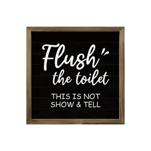 Minimalist square wooden frame bathroom wall decor featuring Flush the toilet funny quote