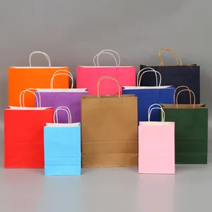 Colorful kraft paper gift bags with handles for shopping and takeout packaging.
