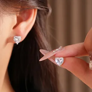 Minimalist silver-tone heart-shaped zirconia stud earrings for women's jewelry