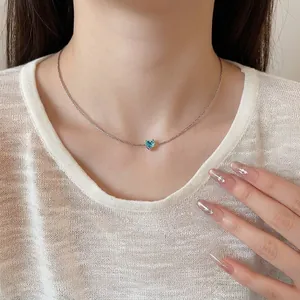 Elegant French style choker necklace featuring a light blue heart-shaped zircon pendant