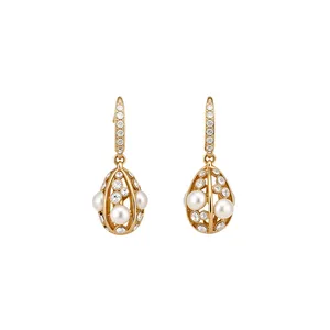 Elegant 14k gold plated teardrop earrings featuring white pearls and clear crystals.