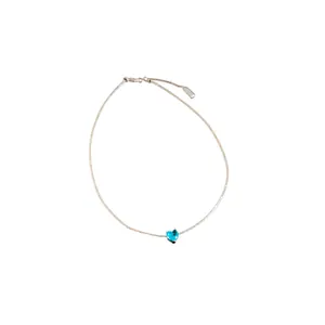 Minimalist silver-tone choker featuring a sparkling blue zircon heart pendant.