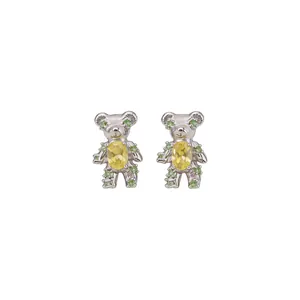 Elegant silver bear stud earrings featuring yellow and green cubic zirconia stones on white