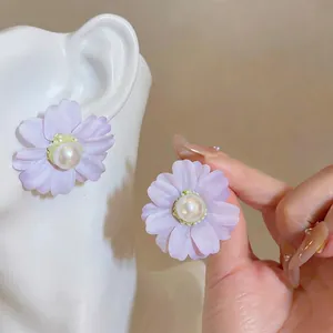 Elegant lavender fabric flower stud earrings with a central pearl design for women
