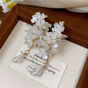 Elegant French-style white flower earrings with pearl tassels and gold-tone finish