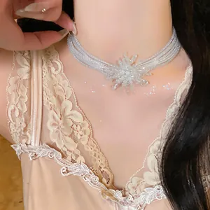 Close-up of French vintage firework pearl choker necklace on neck