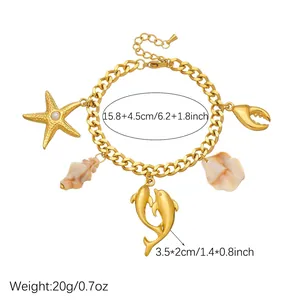 Bracelet à breloques doré en acier inoxydable avec dauphin, étoile de mer et coquillage marin
