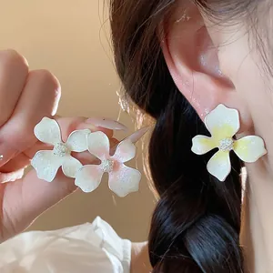 Charming S925 silver floral stud earrings featuring elegant colorful enamel gradient petals