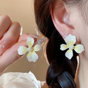 Sweet white and yellow enamel flower stud earrings with S925 silver needle for women