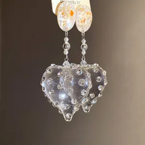 Vintage style transparent resin heart drop earrings with sparkling rhinestone accents