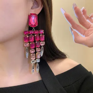 Elegant pink crystal tassel earrings with sparkling rectangular stones for a luxury look
