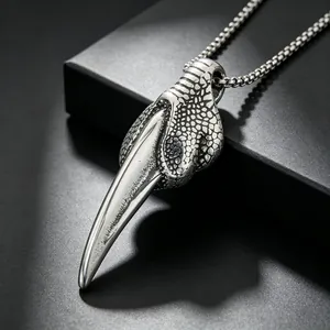 Detailed macro shot showing the intricate textures of a punk stainless steel claw pendant