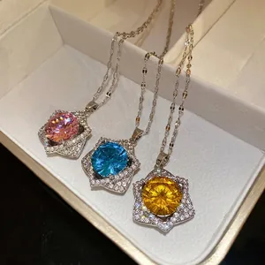 Elegant star-shaped pendant necklaces with colorful round zircon stones in jewelry box