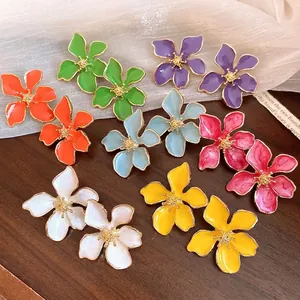 Colorful enamel flower stud earrings with silver needles in various vibrant summer colors