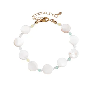 Elegant minimalist shell beaded bracelet with round geometric discs and gold clasp