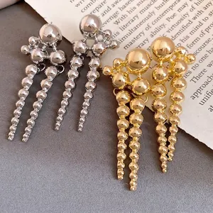 Vintage beaded tassel drop earrings in gold and silver metal finish for stylish women