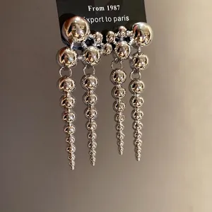 Vintage silver bead drop earrings with multiple cascading strands for a luxury look
