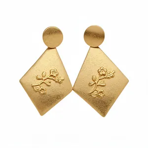 Elegant matte gold rhombus drop earrings with embossed floral branch pattern design