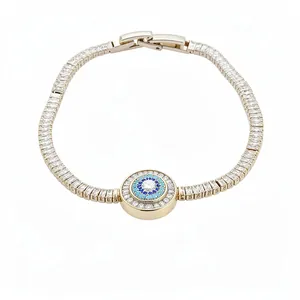 Elegant 18k gold plated bracelet featuring zircon stones and a central evil eye motif