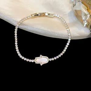 Luxury 18k gold-plated Hamsa hand charm bracelet with pavé-set sparkling cubic zirconia
