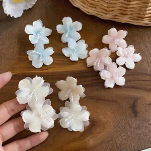 Handcrafted chiffon flower earrings with glass beads in pastel colors for a sweet look