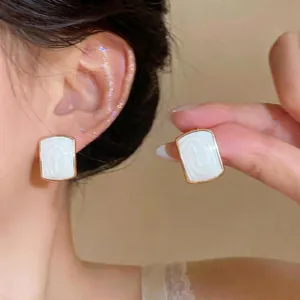 French style minimalist white oval stud earrings with elegant gold frame for women