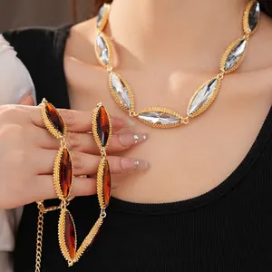 Vintage court style necklace and bracelet set with marquise-cut clear and amber crystals