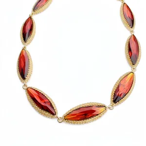 Elegant vintage court-style necklace featuring marquise-cut red crystals in golden settings