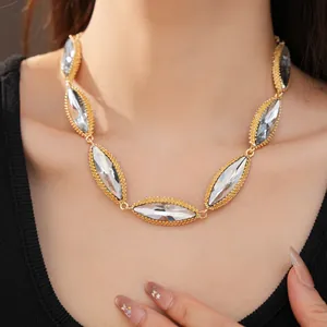 Detailed view of vintage marquise crystal choker necklace featuring beaded gold-tone frames