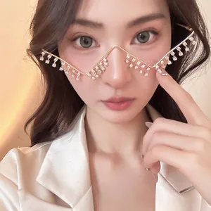 Unique zigzag gold metal eyeglass frame with dangling rhinestones for women, fashion accessory