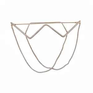 Luxury rose gold rhinestone-encrusted metal eyeglass frame with elegant dangling chains.