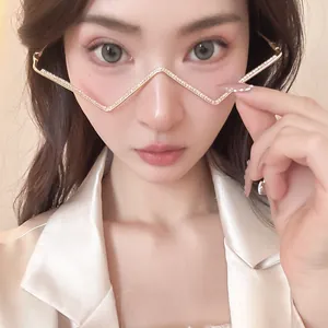 Close-up of personalized gold zigzag rhinestone lensless eyeglass frame on model