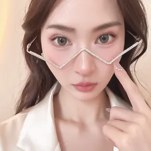 Close-up of a zigzag metal glasses frame with sparkling rhinestone details for women
