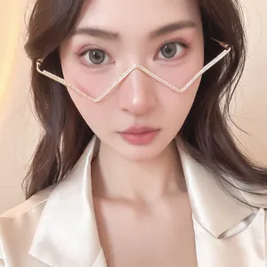 Close-up of a personalized metal rhinestone-studded glasses frame without lenses for women