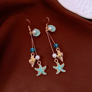 Bohemian starfish and shell drop earrings with pearls and turquoise crystal beads.