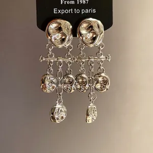 Vintage silver-tone pleated metal tassel earrings with unique high-shine texture