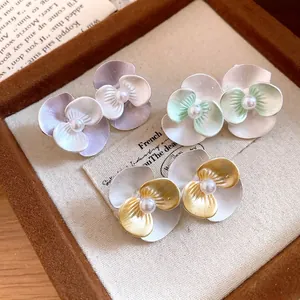 Elegant floral stud earrings featuring faux pearls and colorful enamel petals for women