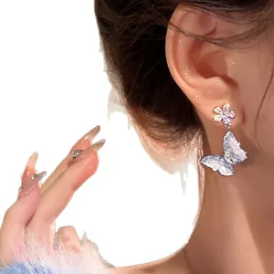 Elegant ice blue butterfly stud earrings with crystal flower accent for women fashion