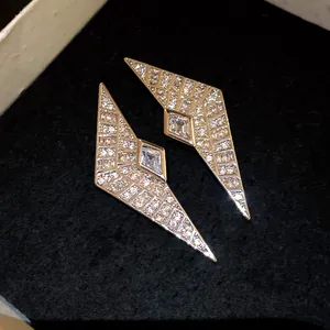 Geometric pave-set rhinestone kite earrings with sparkling cubic zirconia detail