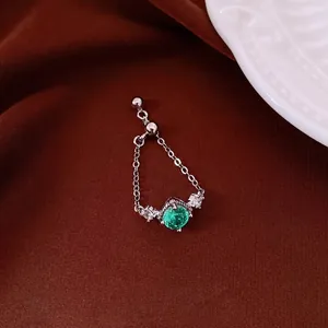 Vintage luxury silver chain ring with green zircon and clear stones accent