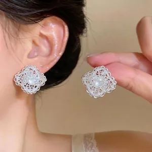 Elegant silver lace hollow diamond earrings with central zircon for women