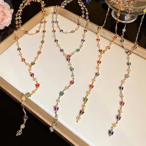 Colorful enamel flower and butterfly Y-shaped necklace for women on display tray