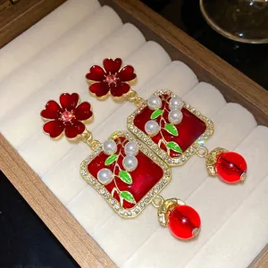 Elegant retro red enamel flower drop earrings with pearls and sparkling rhinestones