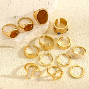 Macro view of vintage gold ring set with irregular textures and amber resin stones