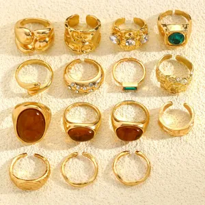 Detailed display of vintage gold rings set with irregular textures and stones